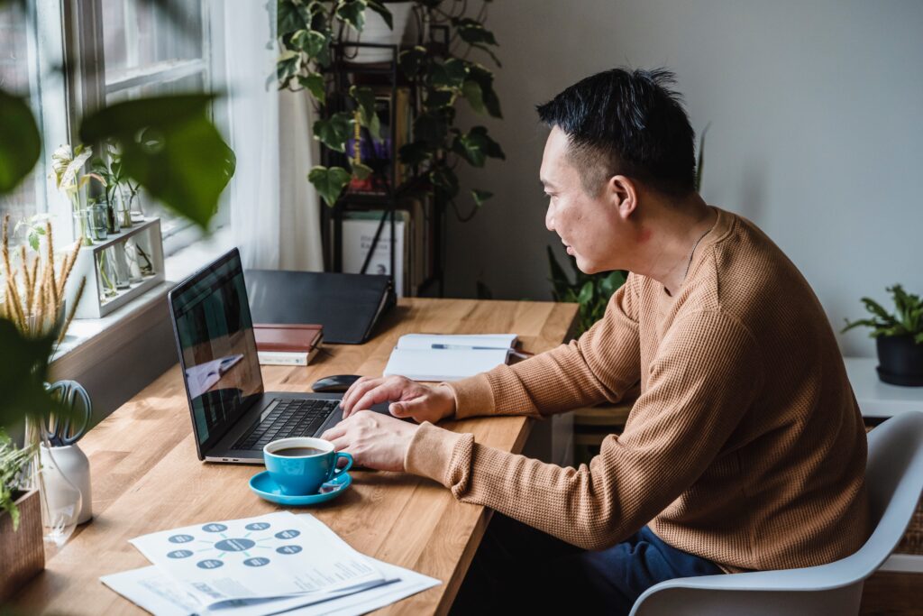 Man at desk on computer working