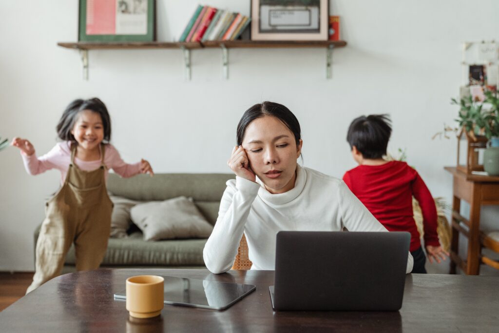 Mom working and kids bothering her