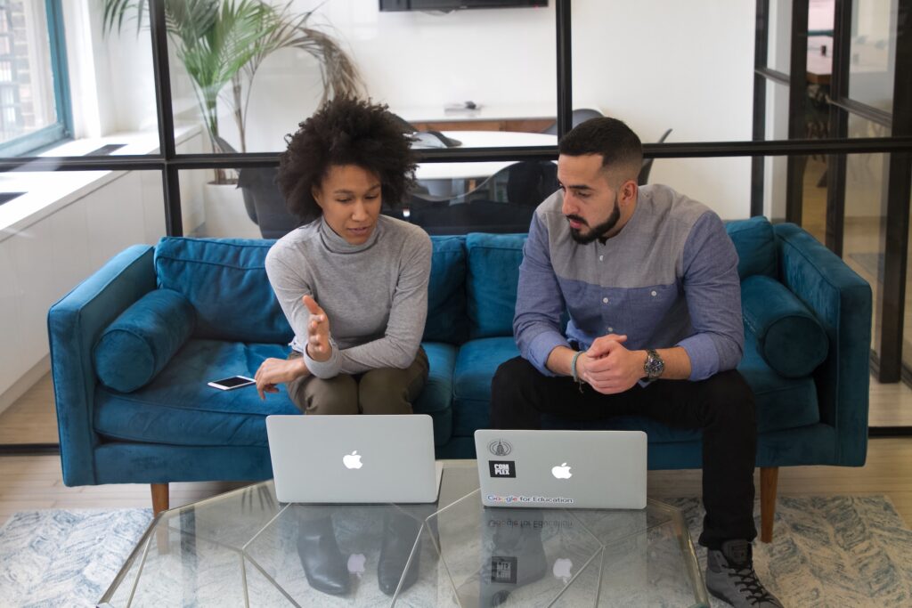 Man and Woman Working on a Computer job skills