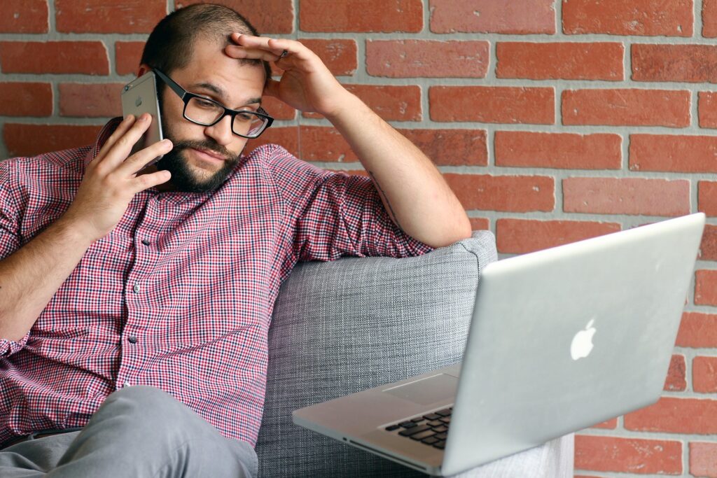 Man Stressed Working on the Computer