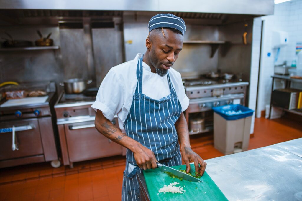 Man Working in a kitchen cooking