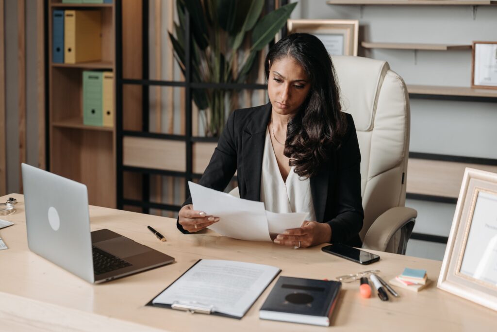 woman sitting at desk working