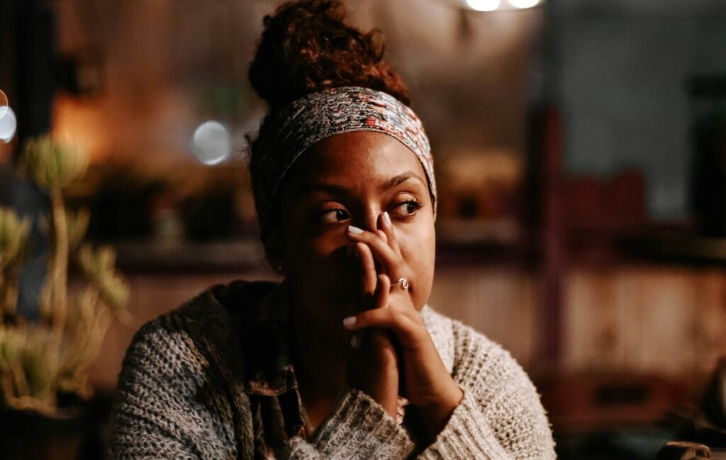 woman looking off stress job search frustration